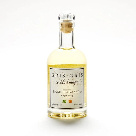 Gris Gris Basil Habanero simple syrup in a 13 oz glass bottle with a cork stopper